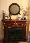 50 Awesome Halloween Decorating Ideas Wood Fireplace and big Wall Clock