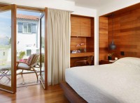 Careful Space Planning Tropical House Bedroom Door View