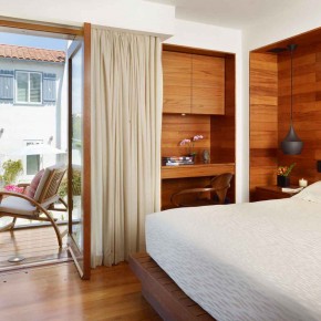 Careful Space Planning Tropical House Bedroom Door View