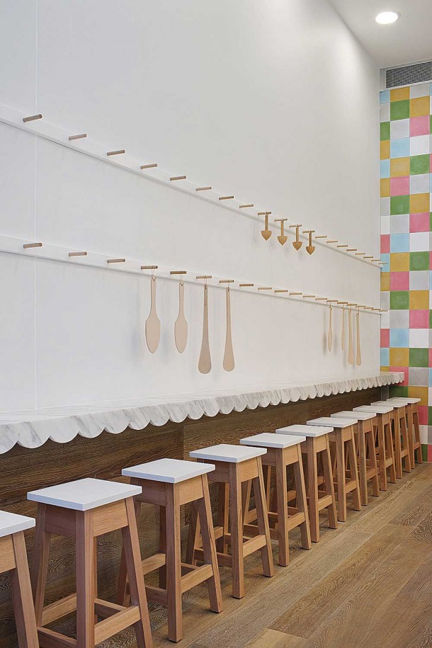 Interior Design for a Cupcake Shop long line white chair