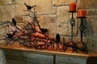 50 Awesome Halloween Decorating Ideas Black Bird on Twig and Candle