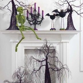 50 Awesome Halloween Decorating Ideas White Fireplace and green Skull