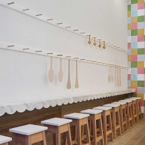 Interior Design for a Cupcake Shop long line white chair