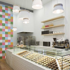 Interior Design for a Cupcake Shop with glass cookies table